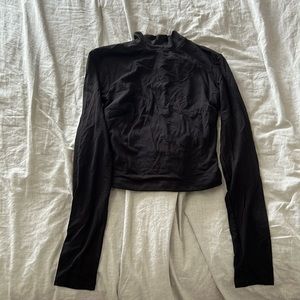 Black laced open back crop top from Dynamite